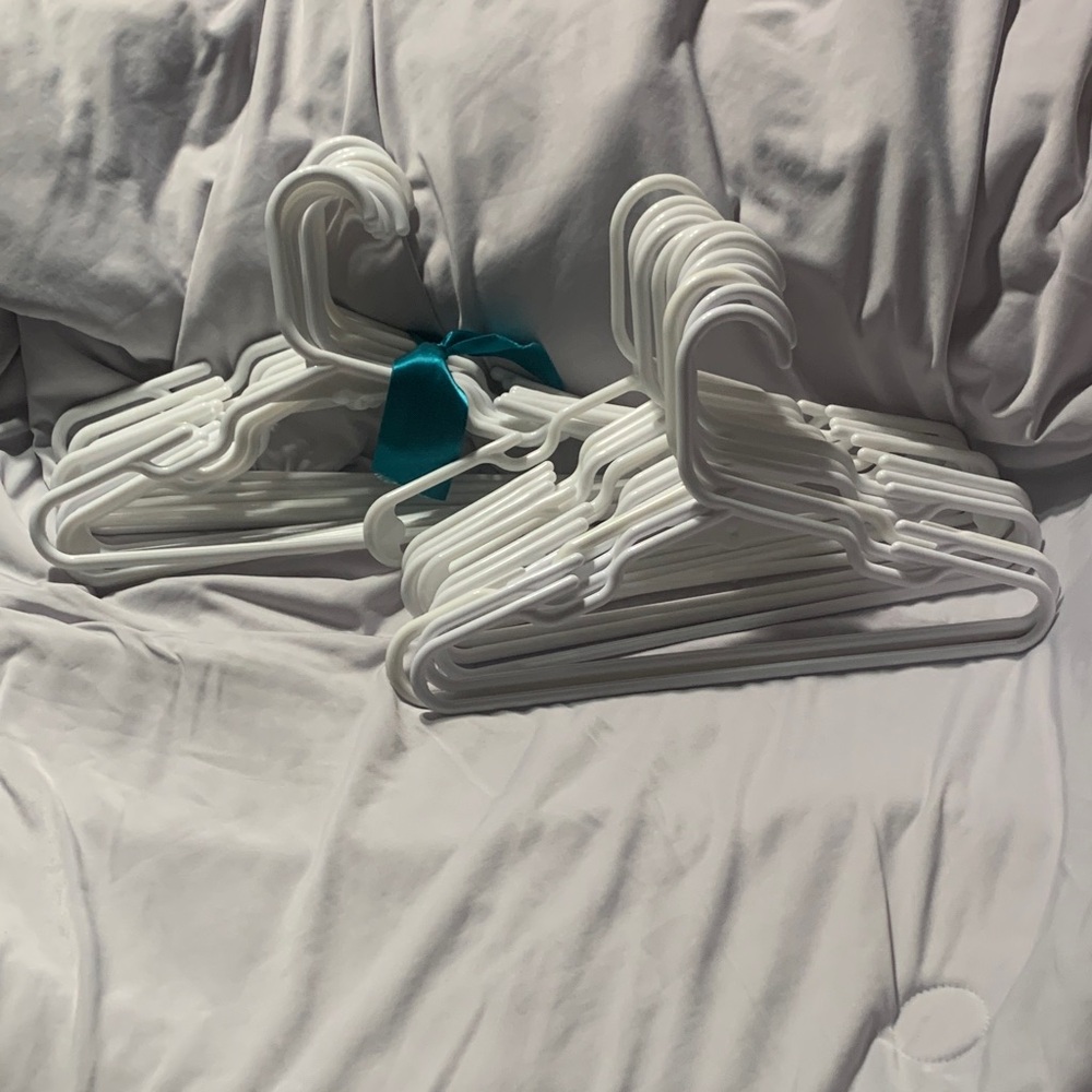 Set of White Plastic Hangers